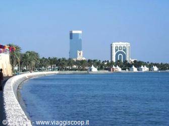 Waterfront promenade with palm trees and towers by the sea, Jeddah