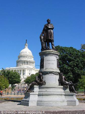 Bronze statue on marble base in front of the US Capitol, Washington