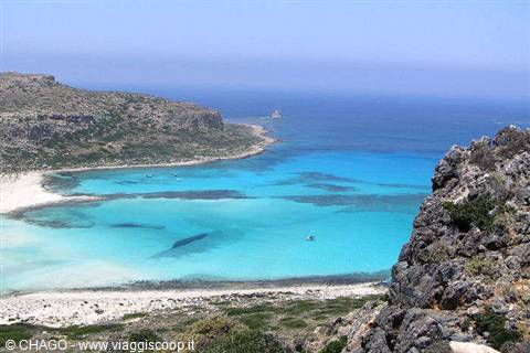 Turquoise Balos lagoon between rocky cliffs and white sand, Crete