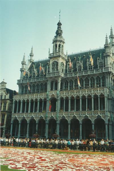 Maison du Roi on Brussels Grand-Place with flower carpet and tourists