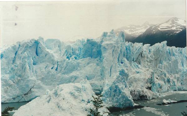 Perito Moreno glacier, blue ice walls under snowy mountains