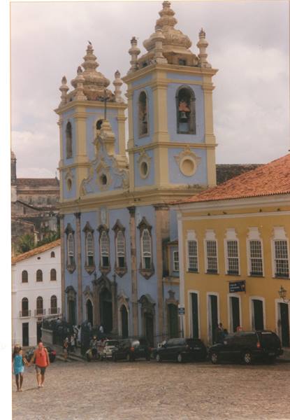 Blue colonial church with two baroque towers on Salvador square