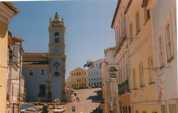 Blue baroque church tower and colorful colonial houses in Pelourinho, Salvador