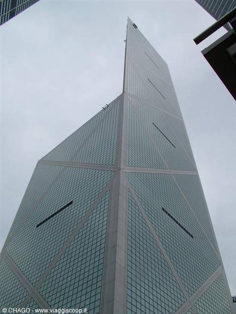 Bank of China Tower in Hong Kong, glass and aluminum facade under gray sky