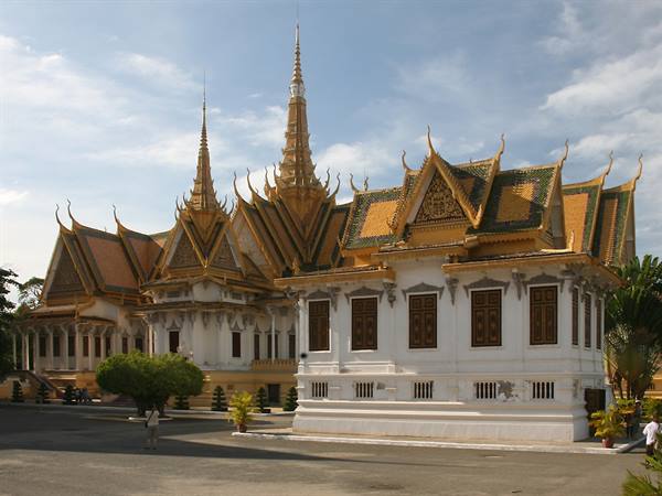 Royal Palace of Phnom Penh, golden spires and white walls in sunlight