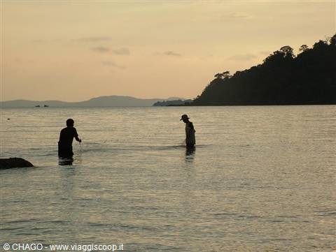 fishermen at sunset