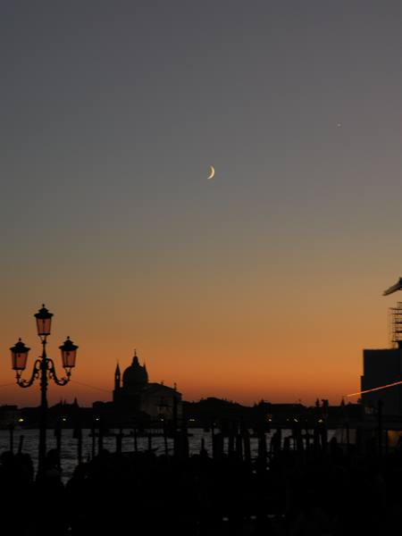moon at sunset over the Redentore
