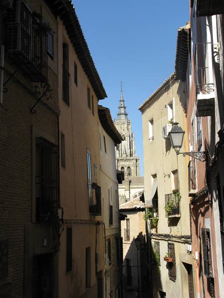 cathedral bell tower seen from a little alley