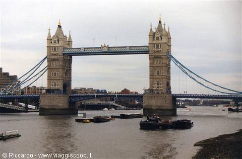 Tower Bridge in London over the Thames with moored boats