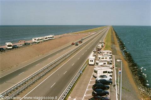 Highway on the Afsluitdijk between two seas, parked campers and seagulls