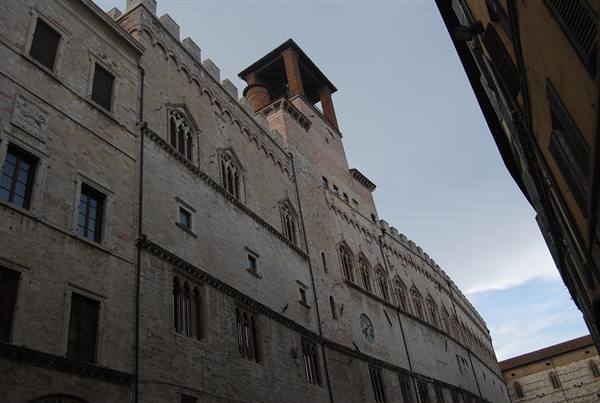 Palazzo dei Priori in Perugia, stone facade with gothic windows and tower