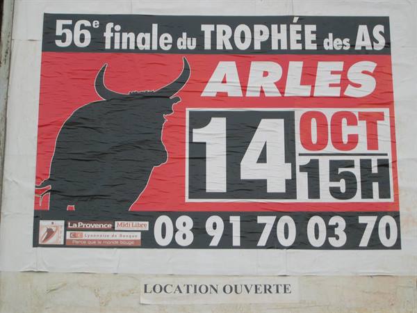 Red and black poster for the Trophée des As final in Arles, bull silhouette