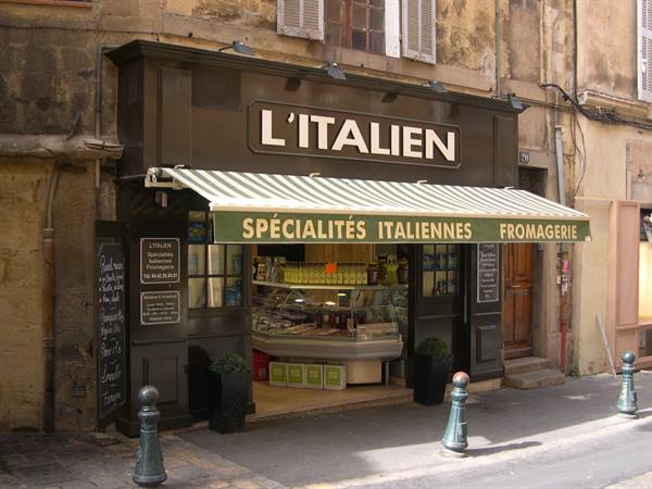 L'Italien shop selling Italian specialties under a striped awning