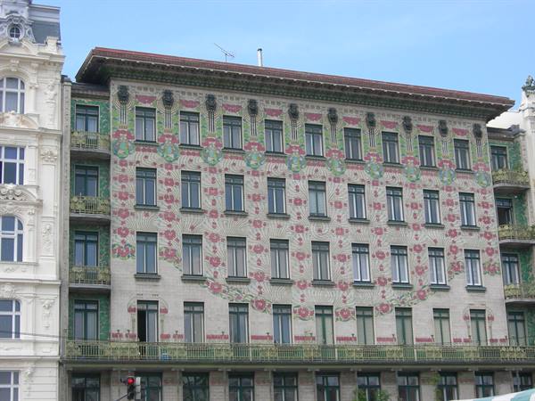 Otto Wagner's Majolikahaus facade in Vienna, pink and green floral tiles