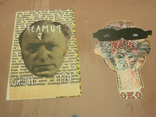 Two paper cutout collages with strange faces on a pink wall