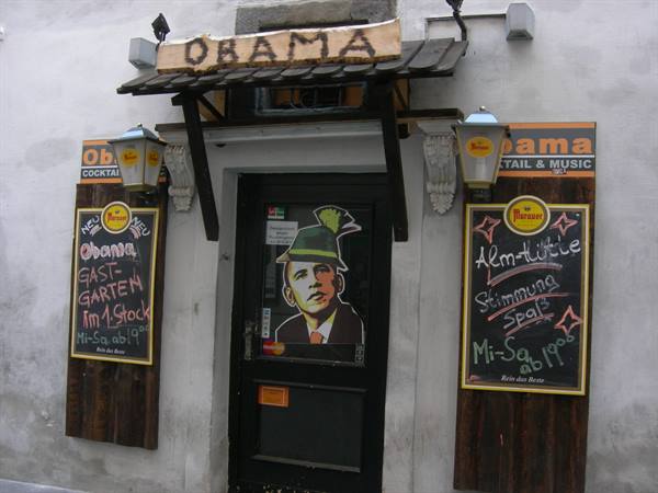 Obama bar entrance with chalkboard menus and lanterns