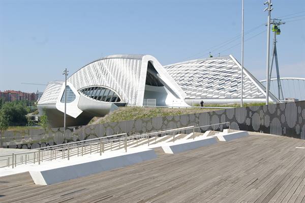 Zaha Hadid Bridge Pavilion at Expo Zaragoza, white facade, wooden walkway