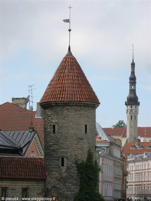 Medieval stone tower with conical tiled roof, Tallinn old town fortifications