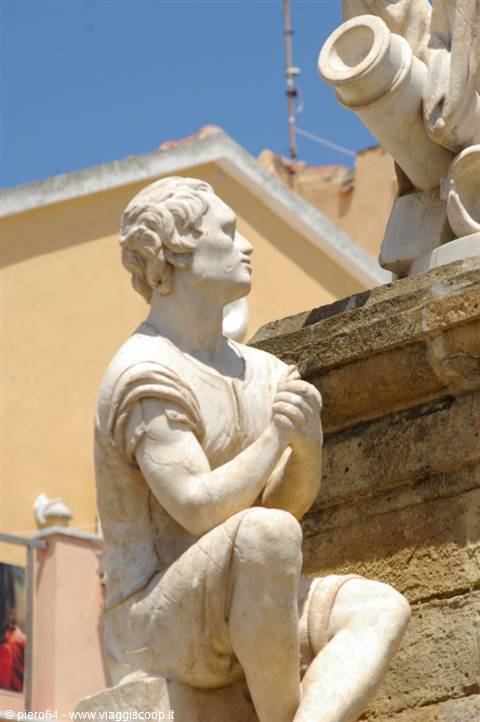 Marble statue of a seated youth, Pretoria Fountain, bright sunlight