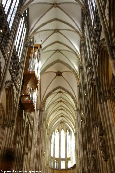 Gothic nave of Cologne Cathedral, ribbed vaults and hanging organ