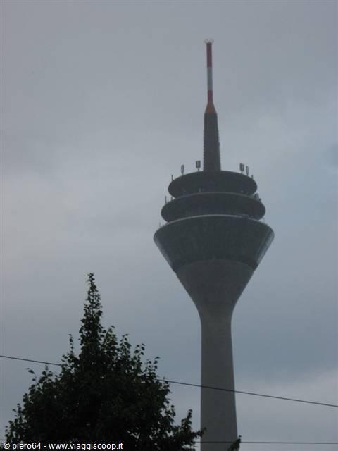 Europaturm telecommunications tower in Frankfurt against a gray sky