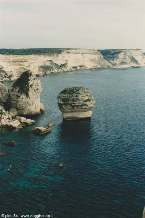 Limestone cliffs of Bonifacio with a rock stack in turquoise sea