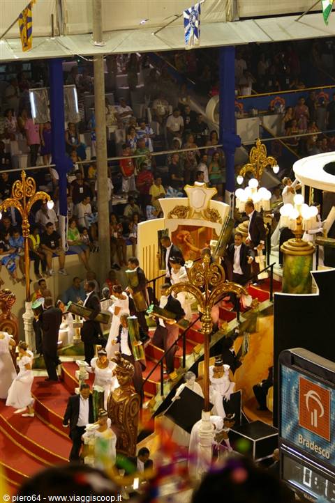 Rio Carnival at the Sambódromo: golden floats and dancers in white parade before the crowd