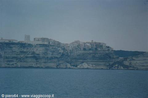 Bonifacio: old houses on limestone cliffs above the blue sea