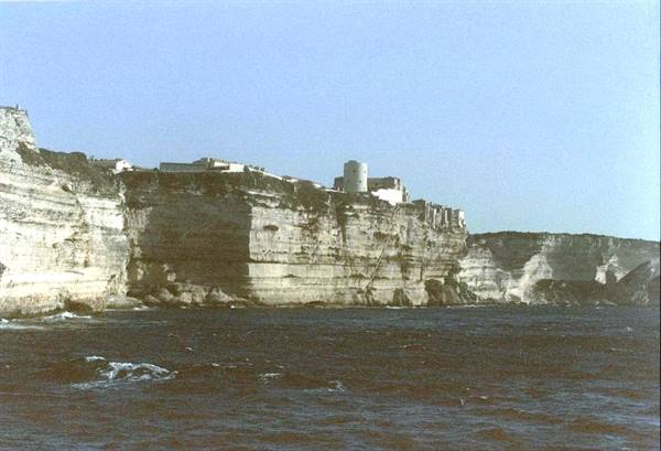 Bonifacio town atop white limestone cliffs above the sea