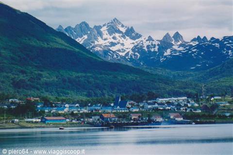 Puerto Williams village on the bay, low houses before the snow-capped Dientes de Navarino