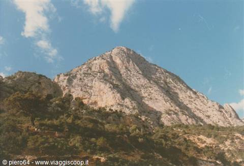 Monte Monaco at San Vito Lo Capo, limestone peak under blue sky