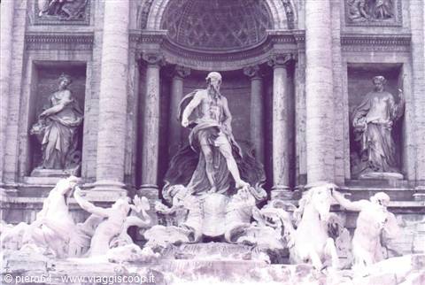 Neptune statue at the center of the Trevi Fountain, white marble, Rome