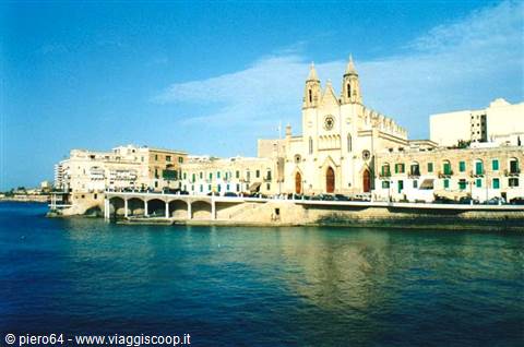Neo-Gothic Balluta church in St Julian's facing the blue sea