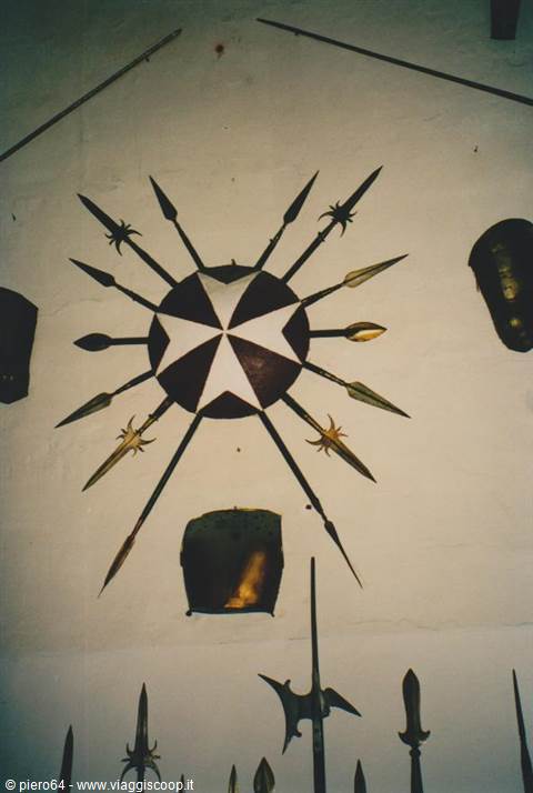 Shield with Maltese cross and spears arranged in a radial pattern
