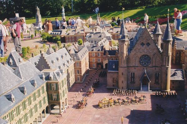 Miniature Binnenhof with Ridderzaal at Madurodam, visitors walking around