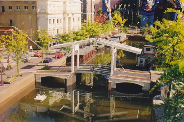 Miniature model of a Dutch drawbridge over a canal, at Madurodam