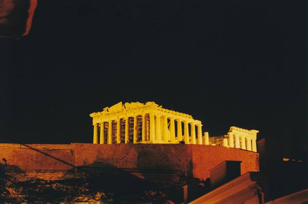 The Erechtheion illuminated at night on the Athens Acropolis