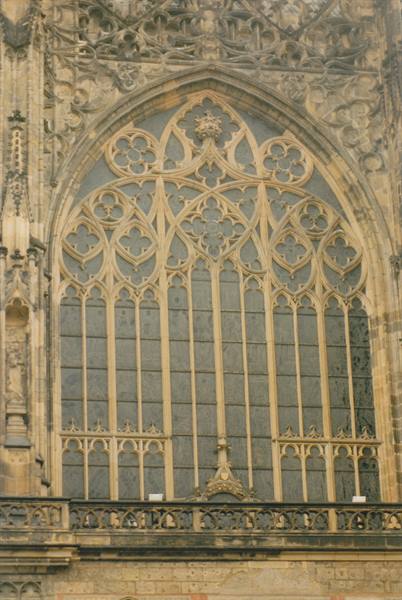 Gothic stone tracery window on St. Vitus Cathedral facade, Prague