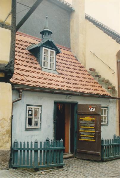 Tiny house on Golden Lane, red tile roof and small dormer window