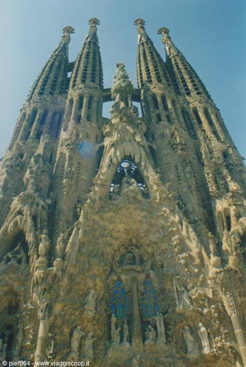 Sagrada Familia in Barcelona: carved stone spires against the blue sky