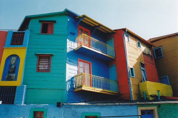 Brightly painted wood and tin houses with balconies, Caminito, Buenos Aires