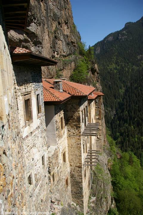 Sumela Monastery: stone buildings clinging to the cliff, red-tiled roofs