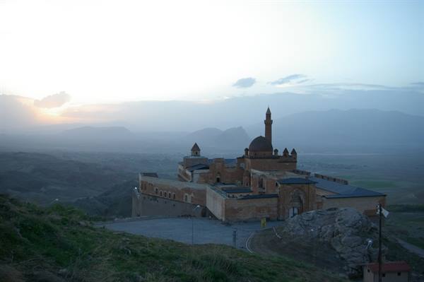 Ishak Pasha Palace at Doğubayazıt, stone domes and minaret in morning mist