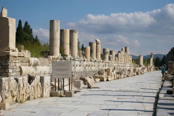 Marble columns and ancient ruins line the street of Ephesus