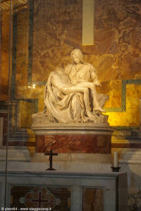 Michelangelo's marble Pietà behind protective glass, inside St. Peter's Basilica