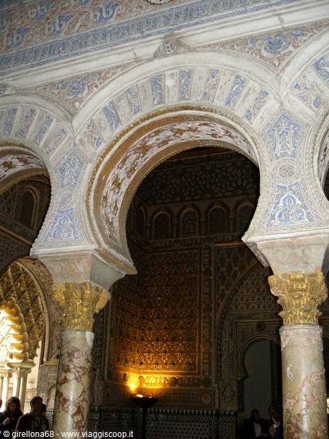 Interlaced arches and marble columns in the Hall of Ambassadors, Seville's Alcázar