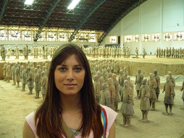 Tourist in front of the Terracotta Army in Xi'an museum hall