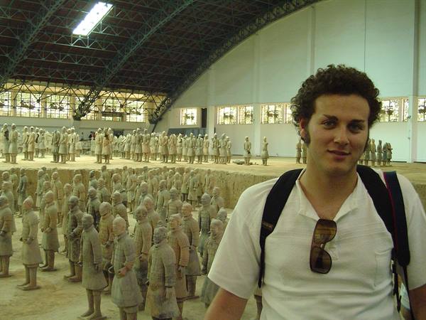 Tourist in front of the terracotta army at the Xi'an museum