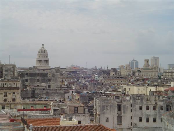 Havana: red-tiled rooftops and the Capitolio under a cloudy sky