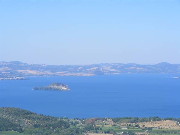 Lake Trasimeno with Isola Minore, cultivated hills in the foreground